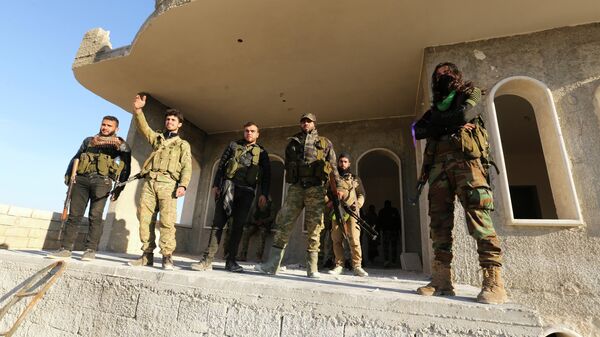 Поддерживаемые Турцией сирийские повстанцы в пригороде Саракеба в провинции Идлиб, Сирия. 27 февраля 2020