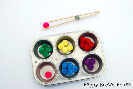 DIY Chopstick Tongs and pom pom transfer from @happybrownhouse www.happybrownhouse.com
