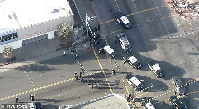 Another aerial shot shows the aftermath of the chaos caused by the heavily armed suspect