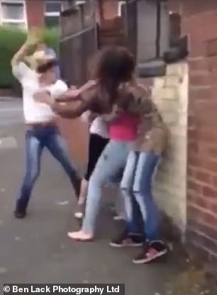 The victim seems to be wearing no shoes as she is attacked