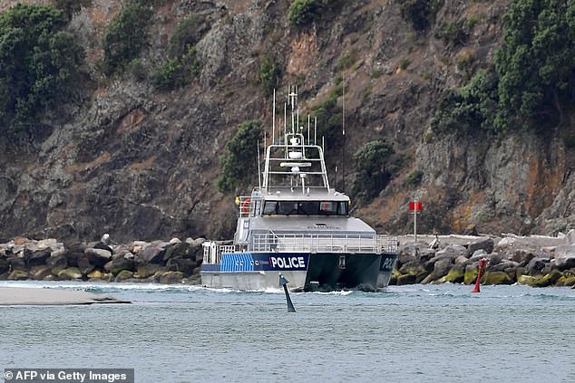PICTURED: The police boat Deodar III arrives into Whakatane after police were unable to get onto White Island to recover the bodies of those killed by the December 9 volcanic eruption