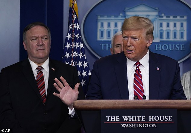 President Trump (right) with U.S. Secretary of State Mike Pompeo (left), pictured together on March 20. Pompeo spoke out after China