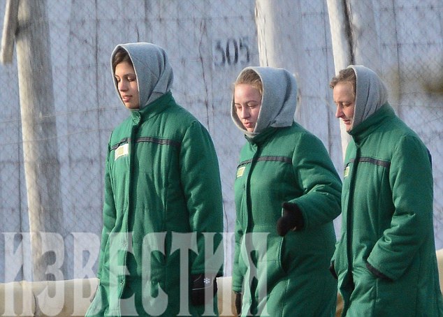 Pussy Riot band member Nadezhda Tolokonnikova, left, alongside fellow inmates at a penal colony