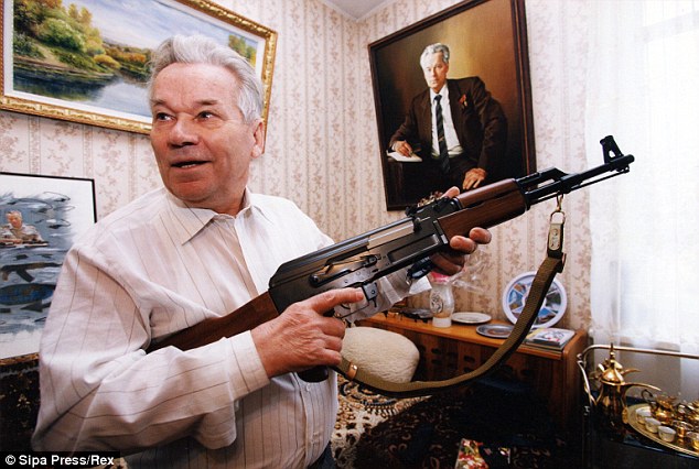 Deadly icon: Mikhail Kalashnikov with the weapon that made his fortune - and won him praise and condemnation. There is one AK-47 for every 70 people in the world, the deadliest weapon ever created