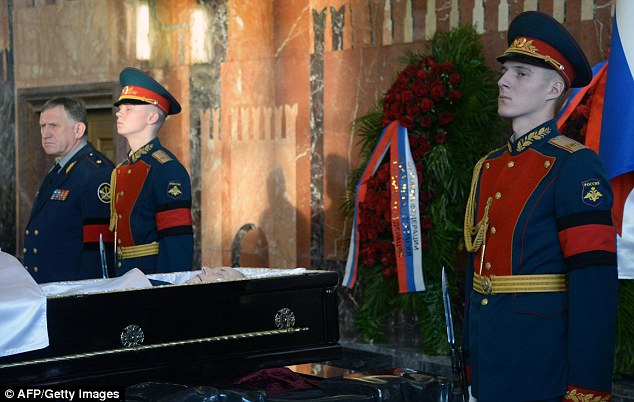 Russian soldiers stand guard near the coffin during the funeral ceremony in Mytishchi outside Moscow