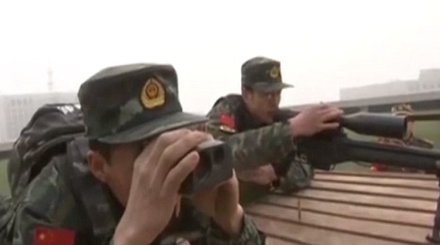 Determination: Snipers are giving all they can during training as only the top ones can represent China in Hungary for a chance to lift up the World Cup