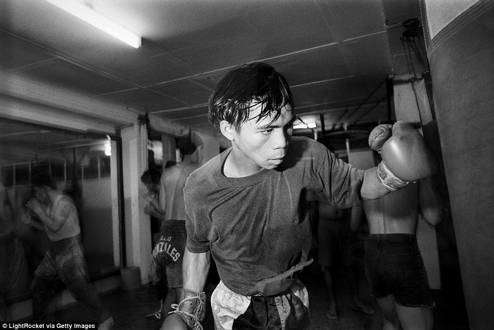 Pacquiao pictured as a 17-year-old in the LM Gym in Manila when mega-fights, like the one against Floyd Mayweather, were just a dream