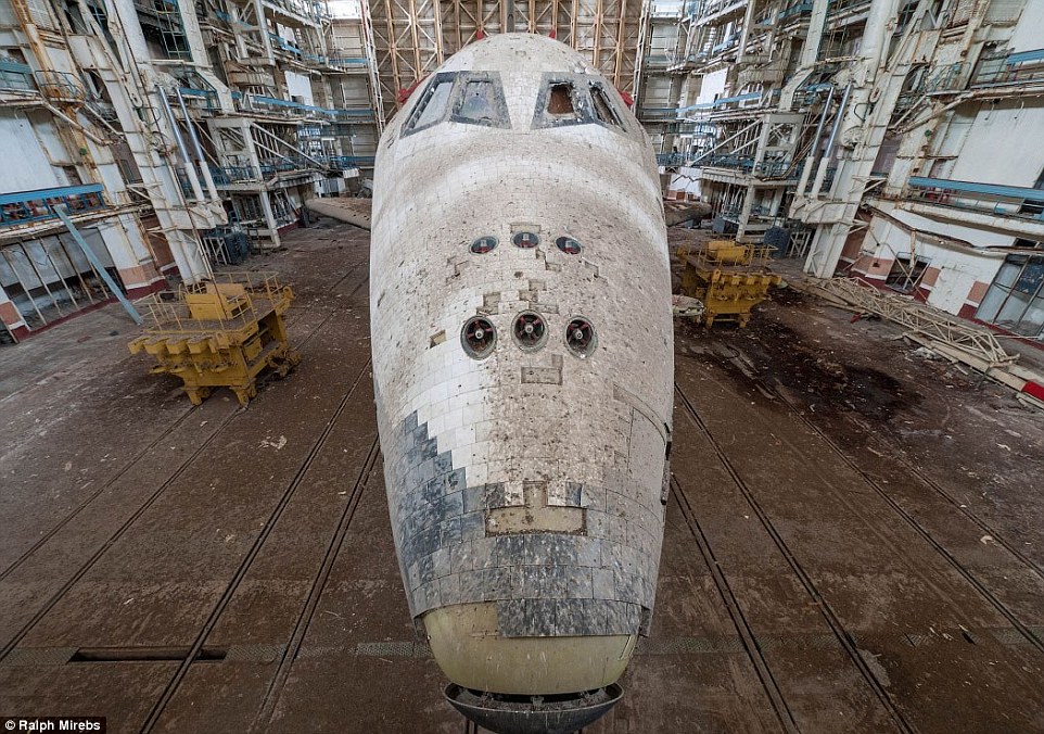 The shuttles are caked in dust and bird poo, with cracked windows also visible. Some other prototype shuttles not seen in this hangar are located in various places around the world