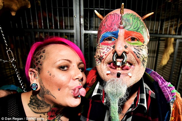 Ted, who has 110 tattoos, 50 piercings and a split tongue, is pictured with his girlfriend Suzannah Vincent