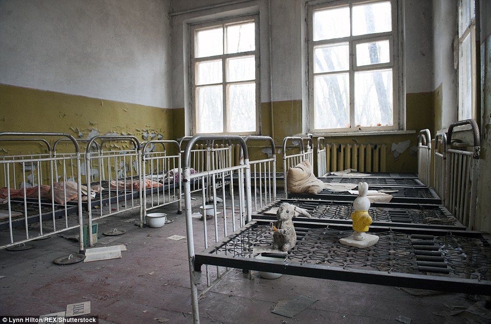 A cluster of rusting beds inside a nursery in Pripyat, located near Ukraine