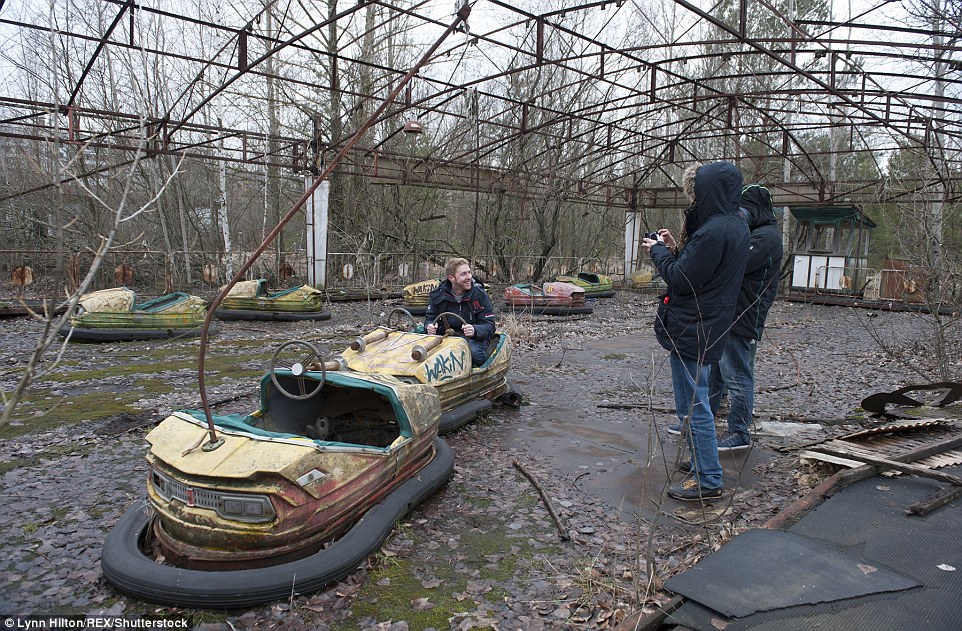A rusting fairground, abandoned homes and overgrown infrastructure are among the ruins of the Ukrainian city of Pripyat