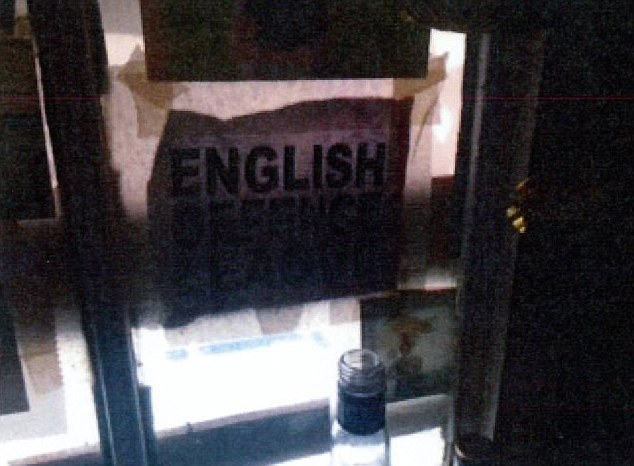 Supporter: Officers also found an English Defence League poster in the window of Joyner