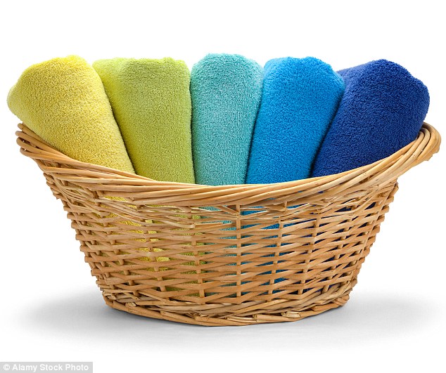 If you add a cap of white vinegar to the rinse cycle, it will disperse any remaining soap and give you a soft, fluffy towel