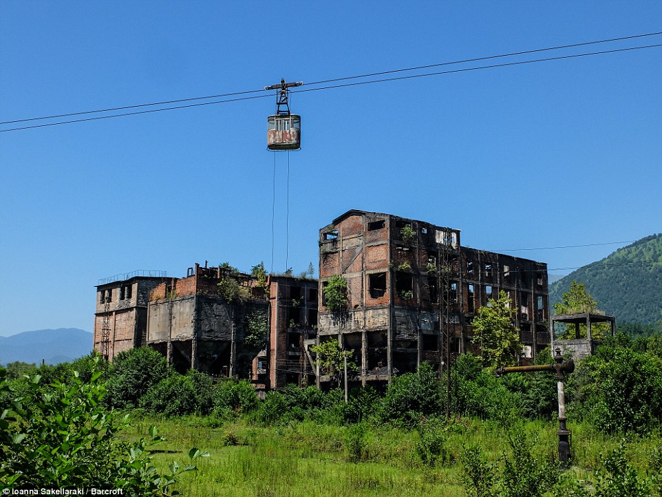 This picture shows a former Soviet factory in Tkvarcheli. A rusting cable car can also be seen suspended in mid-air.  Abkhazia has been a hotly contested state since its formation in 1992 when it broke away from Georgia after the fall of the Soviet Union