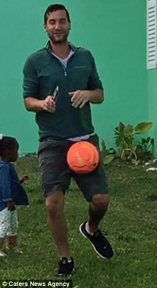 The photographer and his team had been invited to join in a kickabout with some children in Bermuda