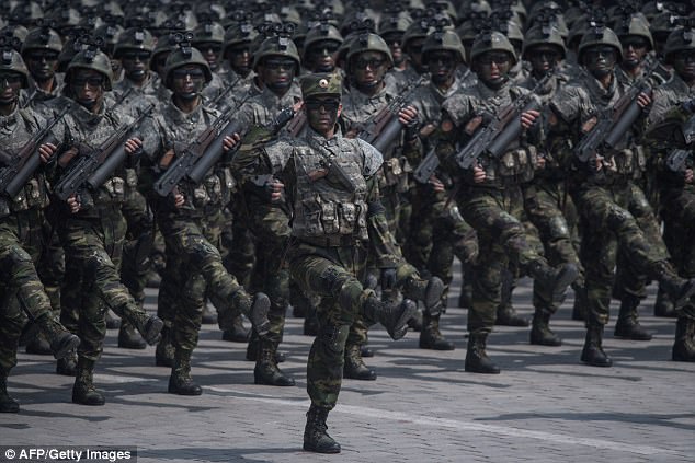 Thousands of goose-stepping troops paraded through Pyongyang in a show of strength on Saturday