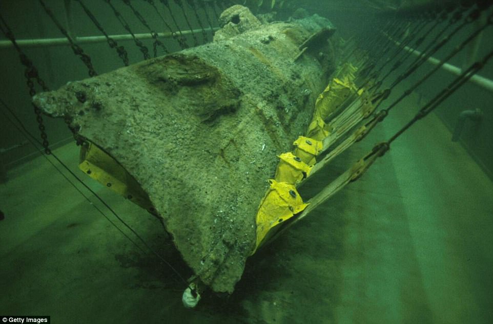 Researchers have found human remains inside the H.L. Hunley (pictured), the first submarine in history to sink an enemy warship. It is believed the tooth belonged to a  Confederate Navy Seaman who was just 24 years old when he died