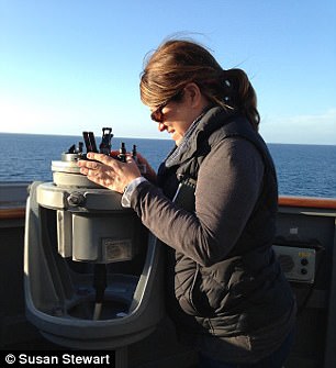 Dr Susan Stewart checking the gyroscope on the guided missile destroyer USS Spruance as part of measuring the position of the setting sun while participating in the Office of Naval Research’s scientist at sea program. (Courtesy of Susan Stewart)