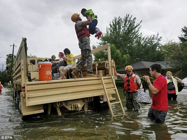 Texas National Guard soldiers arriving to aid citizens in heavily flooded areas from the storms of Hurricane Harvey in Houston, Texas, USA, 27 August 2017. The areas in and around Houston and south Texas experienced record floods after more than 24 inches of rain 