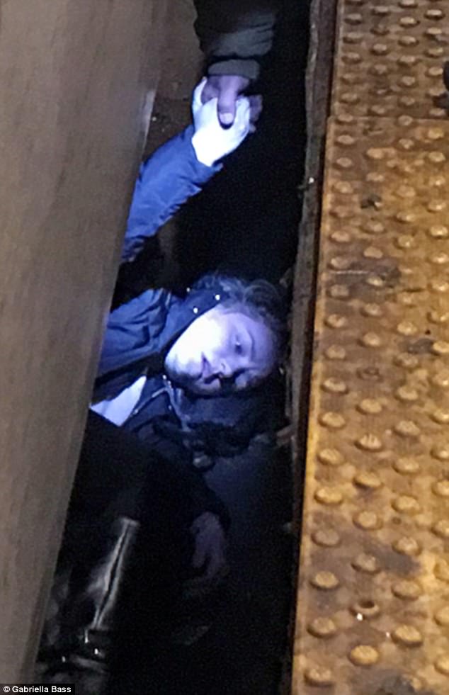 Rikke Bukh, 22, survived fainting and falling onto the subway track at a station in Brooklyn just as a Manhattan-bound train approached the platform on Thursday morning