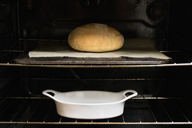 crusty bread on a baking steel in the oven