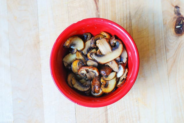 mushrooms in a red bowl