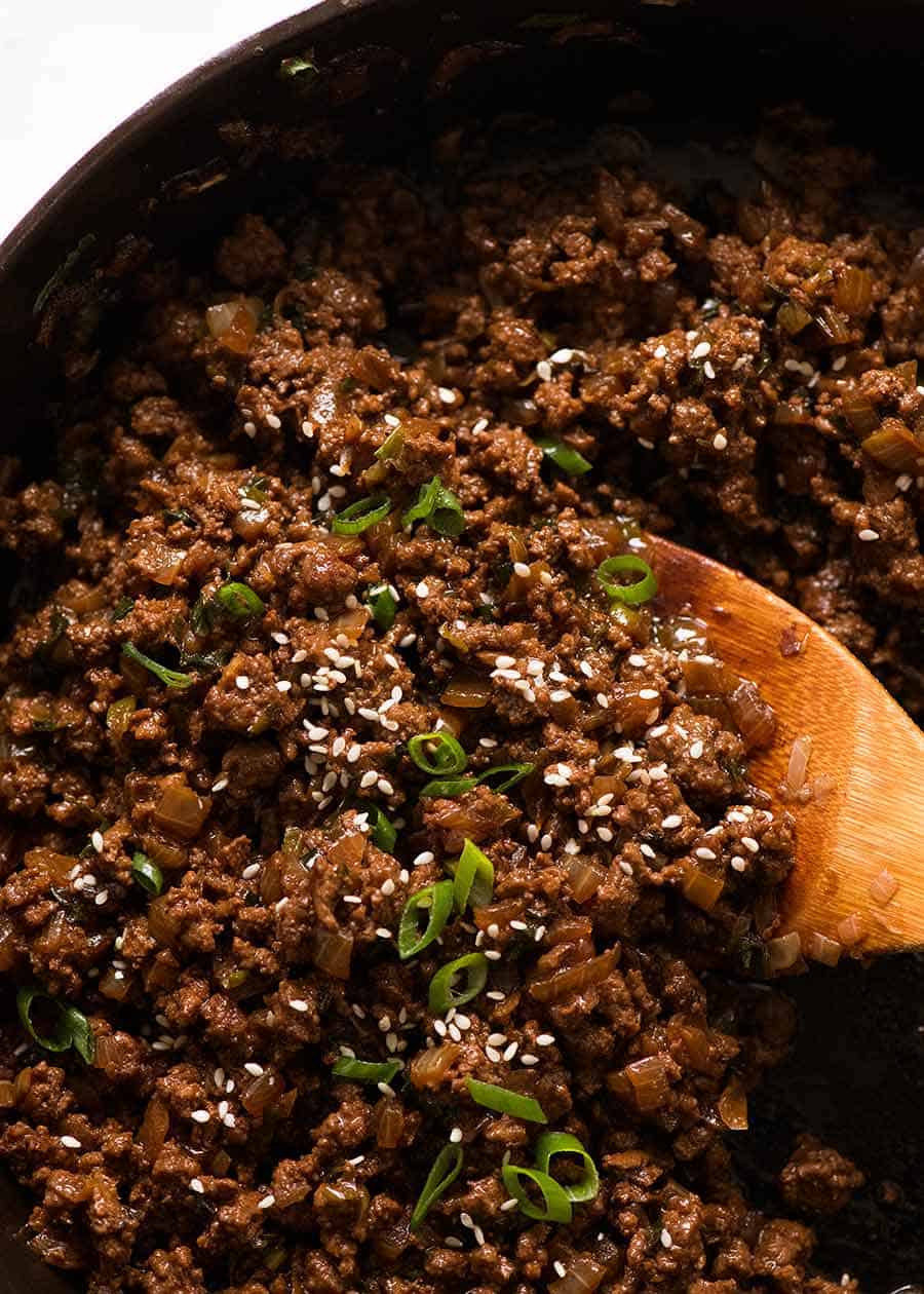 Close up of Asian Ground Beef in a black skillet, ready to be served