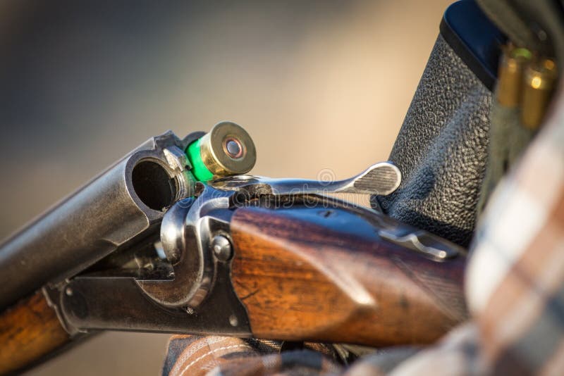 Full hunter hunting rifle royalty free stock photography