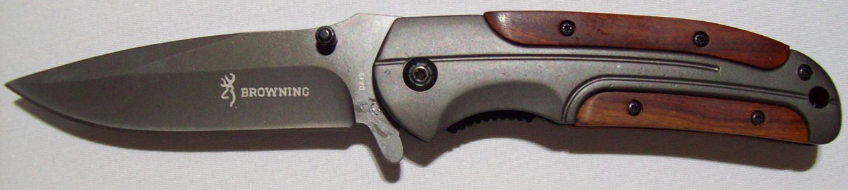 Выкидной нож с боковым выбросом клинка
