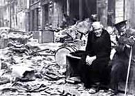 Photograph showing Berliners surveying the ruins of their city