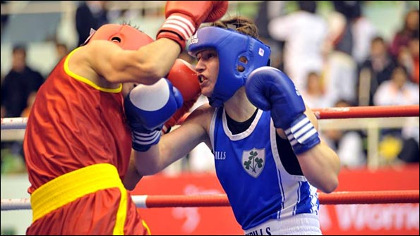 Irish world champion Katie Taylor (right) would be a strong contender for gold in 2012 if women