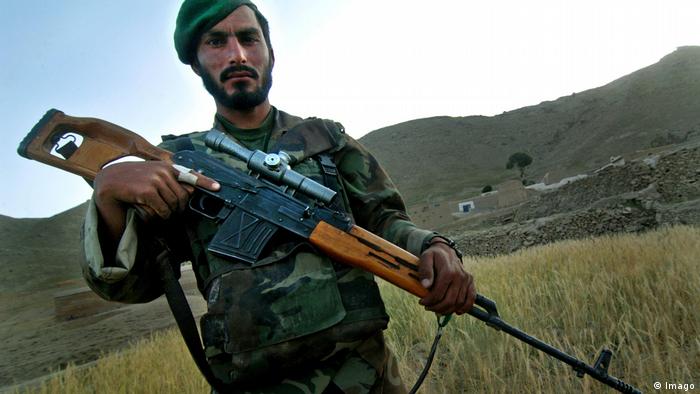 An Afhan soldier showing his Dragunov sniper rifle while patroling with US forces in Afghanistan. (Imago)