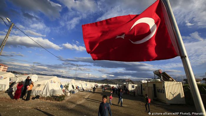 A Turkish flag waving on the border to Syria