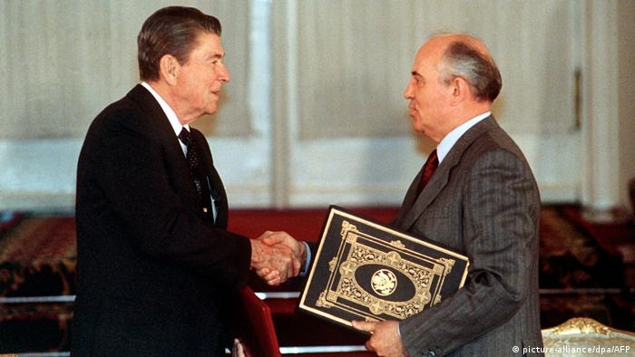 Ronald Reagan and Mikhail Gorbachev exchange ratified copies of the INF treaty