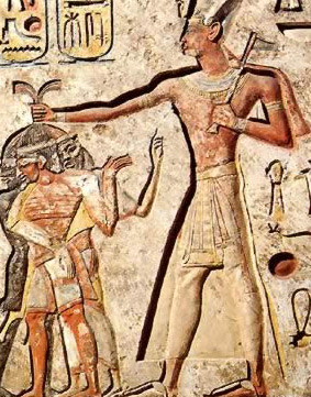 Ramesses II smiting his enemies with a battle axe rather than a mace